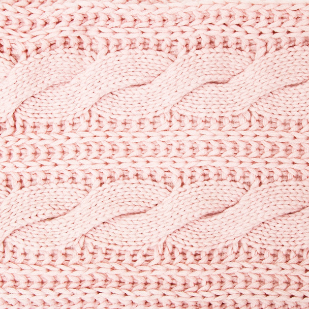 Stricken Hintergrund Textur hellrosa Farbe. Stoff textilen Hintergrund. Muster aus rosa Wolle - Foto, Bild