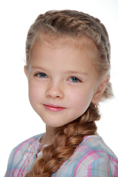 Portrait of a beautiful girl with a pigtail - Фото, зображення