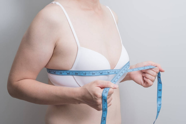Fat overweight woman with  measurement tape - Foto, imagen