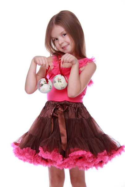 Little girl with a Christmas toy - Foto, imagen