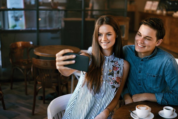 Friends Taking Photos, Drinking Coffee In Cafe. - Valokuva, kuva