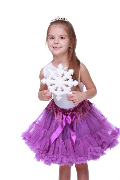 Christmas girl with snowflake in hands - Photo, Image