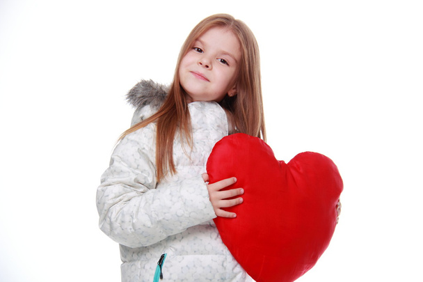 Little girl with a heart - Fotoğraf, Görsel