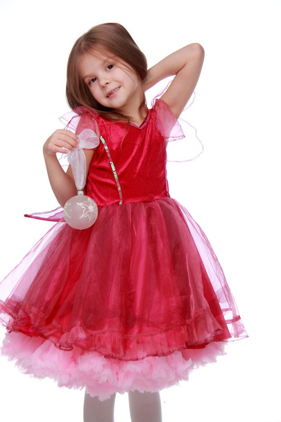 Little girl with a Christmas toy - Foto, Imagen