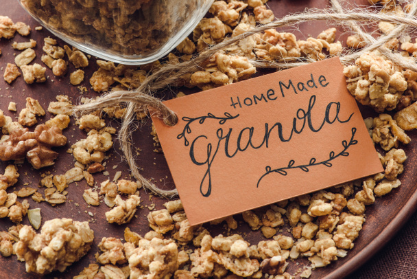 homemade crunchy granola with label on tray - Photo, Image