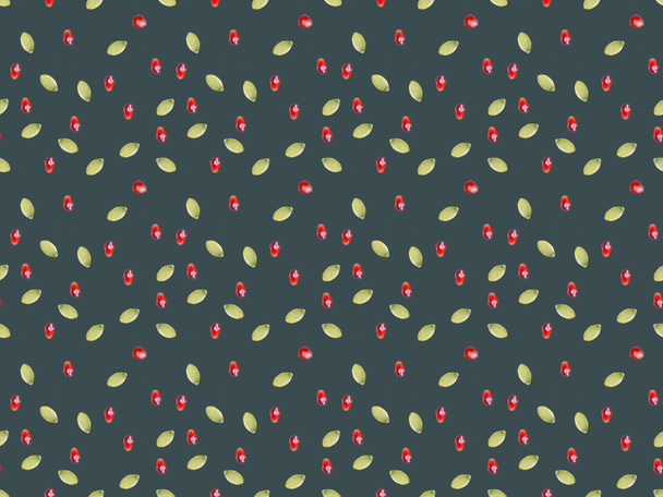 pattern of pomegranate and pumpkin seeds isolated on gray - Φωτογραφία, εικόνα