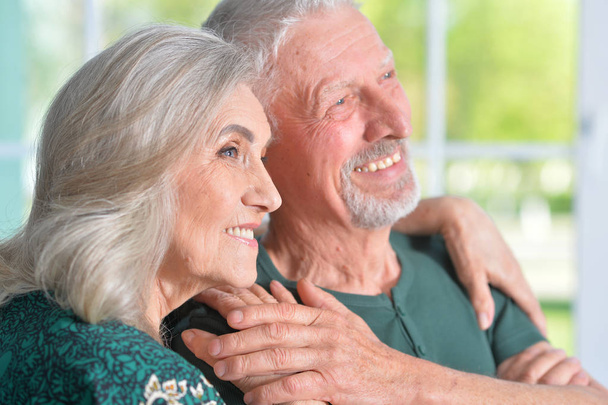Close-up portrait of a happy senior couple at home - Фото, зображення