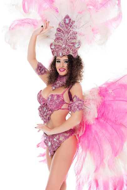 happy girl posing in carnival costume with pink feathers, isolated on white - Photo, Image
