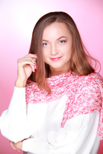 Beautiful girl in pink scarf - Zdjęcie, obraz