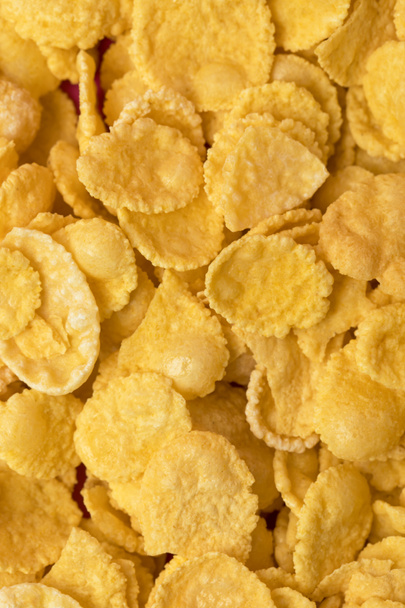 close-up full frame background from healthy crispy corn flakes  - Foto, Bild