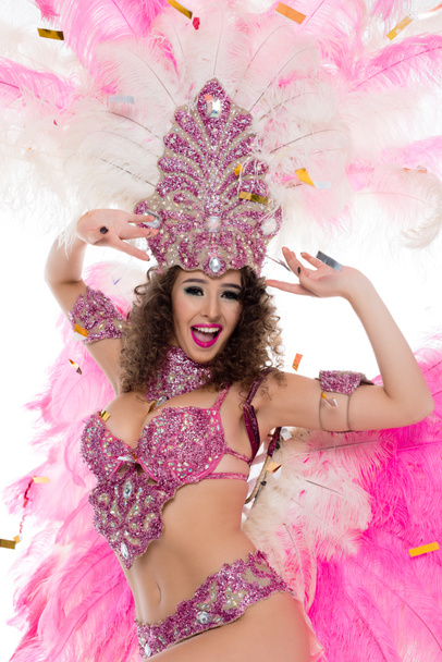young woman in pink carnival costume, isolated on white - Fotó, kép