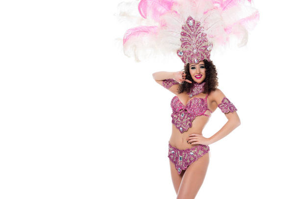 Cheerful woman in carnival costume with pink feathers isolated on white - Foto, Imagem