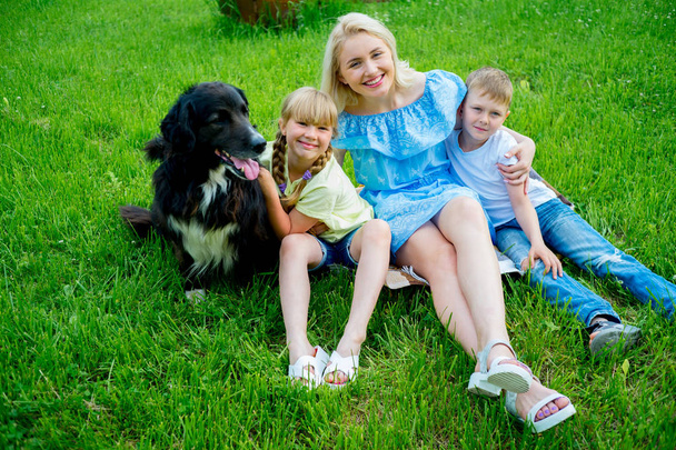 Family picnic with a dog - Foto, imagen