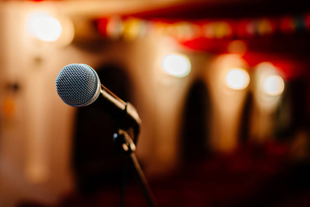 A microphone on stage - Фото, зображення