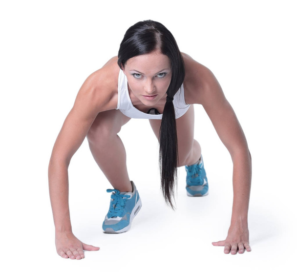 Attractive fitness woman doing low start cross fit exercises - Valokuva, kuva