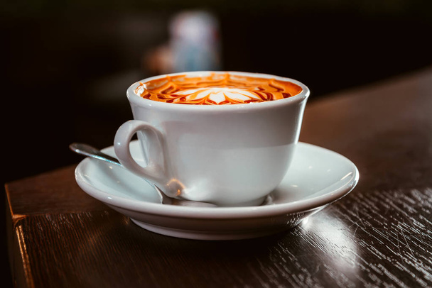 Cup of cappuccino in a coffee shop - Fotografie, Obrázek