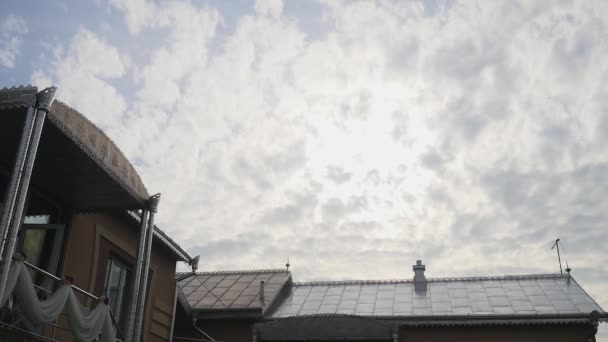 house on blue sky background - Filmati, video