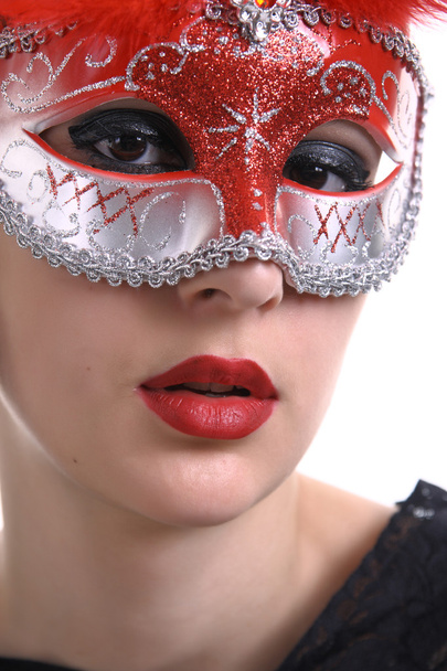 Beautiful woman with a carnival mask - 写真・画像