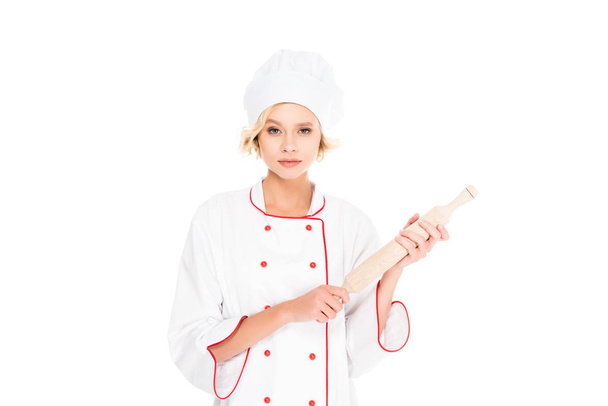 portrait of young female chef with rolling pin in hands isolated on white - Fotografie, Obrázek