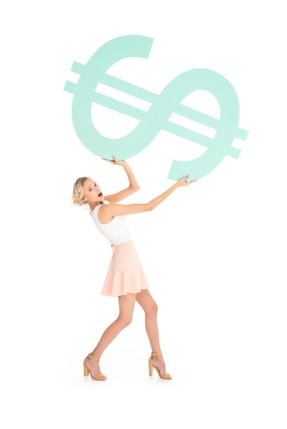 shocked woman holding big dollar sign isolated on white - Foto, Imagen