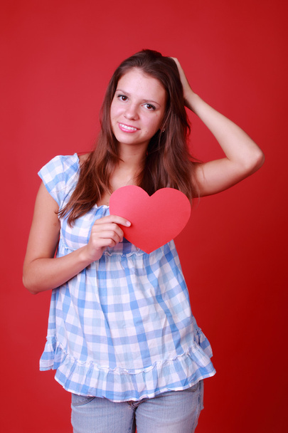 Girl with symbol of heart - Photo, Image