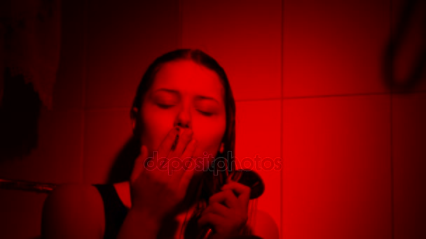 Crying young girl with cigarette in shower. Depression, vilolence, abuse concept. - Video, Çekim