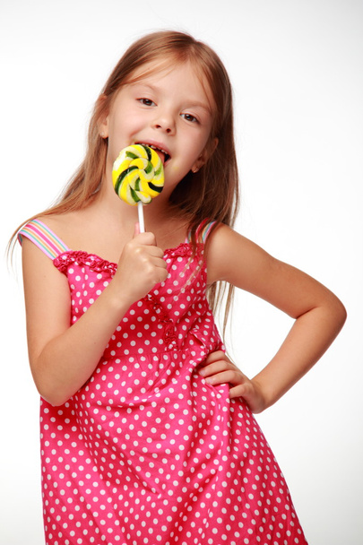 Little girl with lollipop - 写真・画像