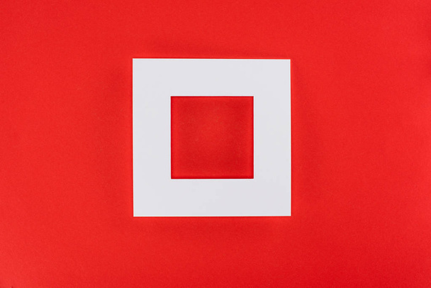 white frame isolated on red with copy space - Zdjęcie, obraz
