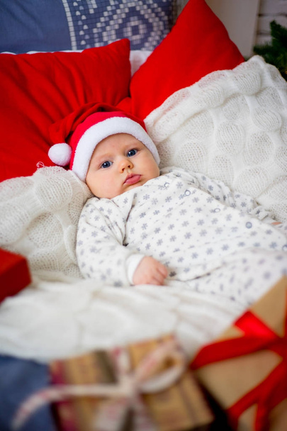 Baby in a christmas hat - Photo, Image