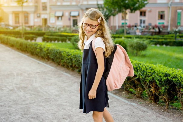 Portrait of young pretty student on the way to school - Foto, imagen