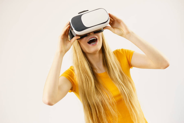 Girl wearing virtual reality goggles. - Φωτογραφία, εικόνα