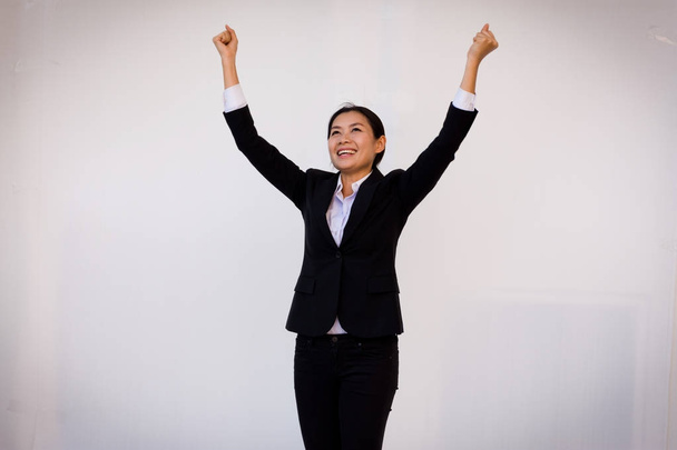 happy young businesswoman with hands up. - Zdjęcie, obraz