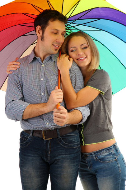 Loving couple with umbrella isolated on white - Photo, image