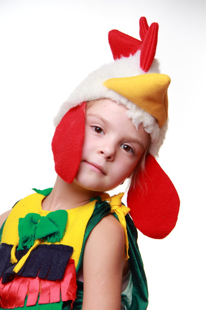 A little girl dressed as a rooster - 写真・画像