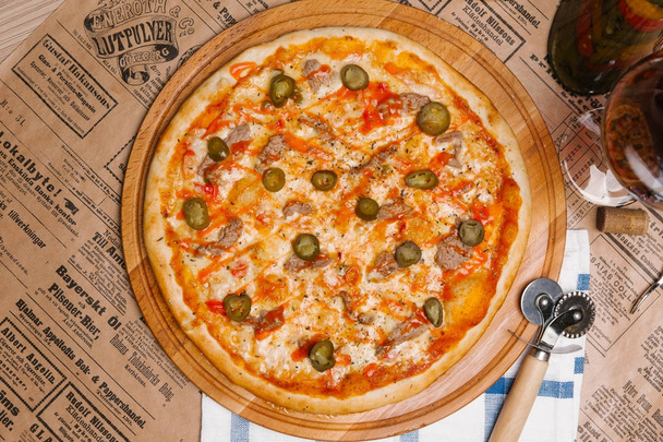 Cheese pizza with beef and jalapeno pieces  - Photo, Image