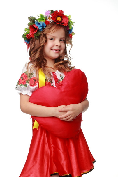 Image of cute little girl dressed in traditional Ukrainian on Valentine Day - 写真・画像