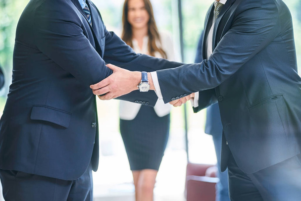 Business people shaking hands, finishing up a meeting in office - Photo, Image