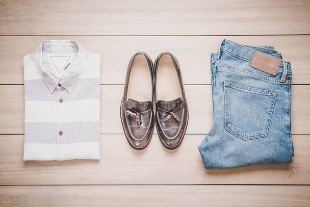 Clothing for men on the wooden background - Foto, afbeelding