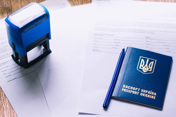 Паспорт гражданина Украины с документами и штампами
. - Фото, изображение