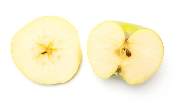 Sliced apple (Smeralda variety) isolated on white background top view compare ring slice and cross section hal - Foto, imagen