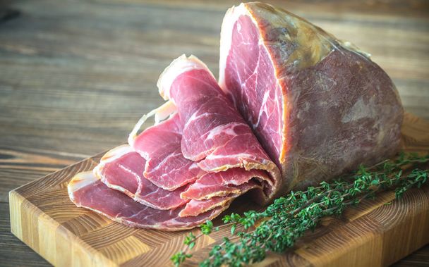 Prosciutto with fresh thyme - Photo, Image