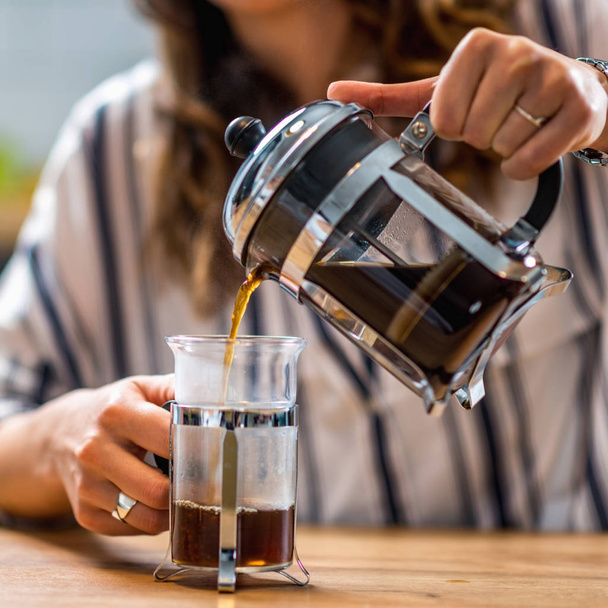 woman preparing coffee in French press  - Photo, image