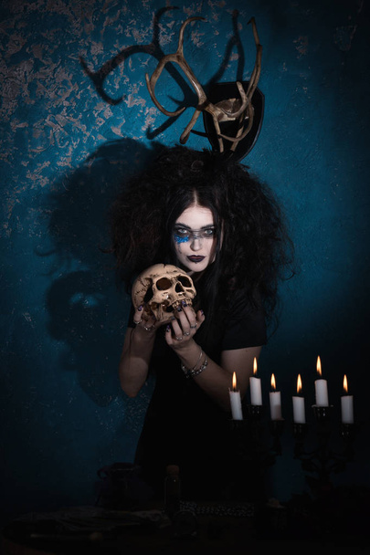 Evil witch with a skull  - Photo, Image
