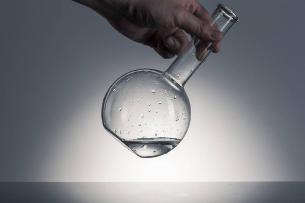 Laboratory graduated beaker isolated on white background - Foto, afbeelding