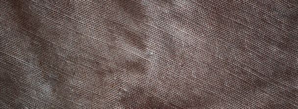 Çok eski bir kahverengi çadır bezi dokusu. Retro doku kanvas malzeme ile. Arka plan resmi kopya alanı ile - Fotoğraf, Görsel