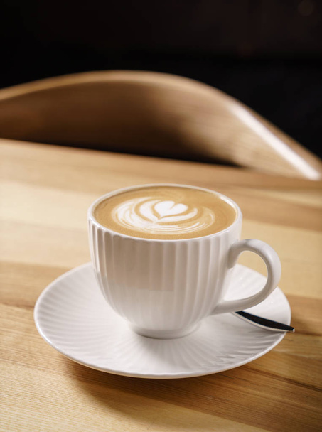 cup of cappuccino on table, close up - Φωτογραφία, εικόνα