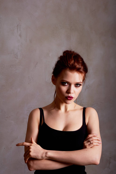 portrait of a beautiful red-haired girl.Close. Plump lips. - Foto, afbeelding