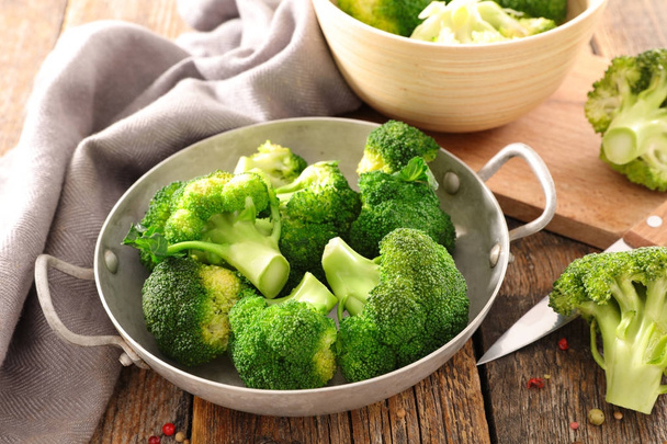 fresh broccoli bunch on wooden table - Photo, Image