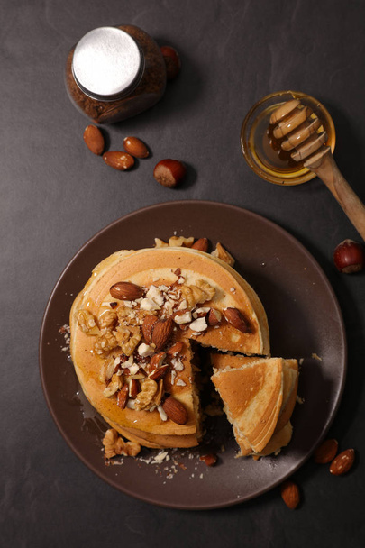 pancake with syrup and nuts - Photo, image