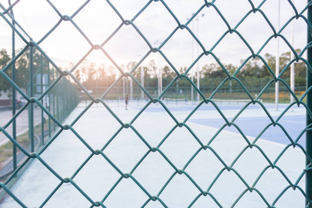 steel wire mesh fence or wall patterns and tennis court - Photo, Image